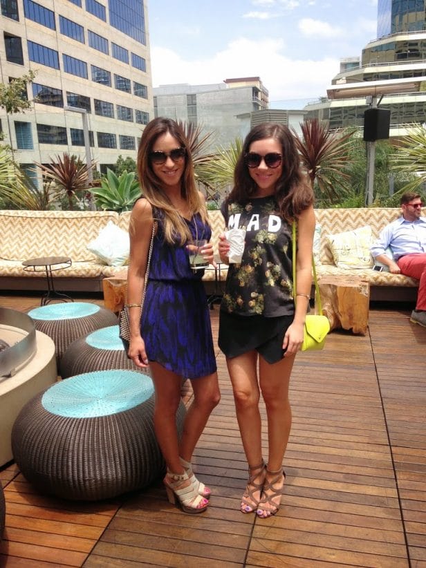 Blogger Nihan and her friend showing her black and green fun summer brunch outfit by the pool at the W Hotel in San Diego
