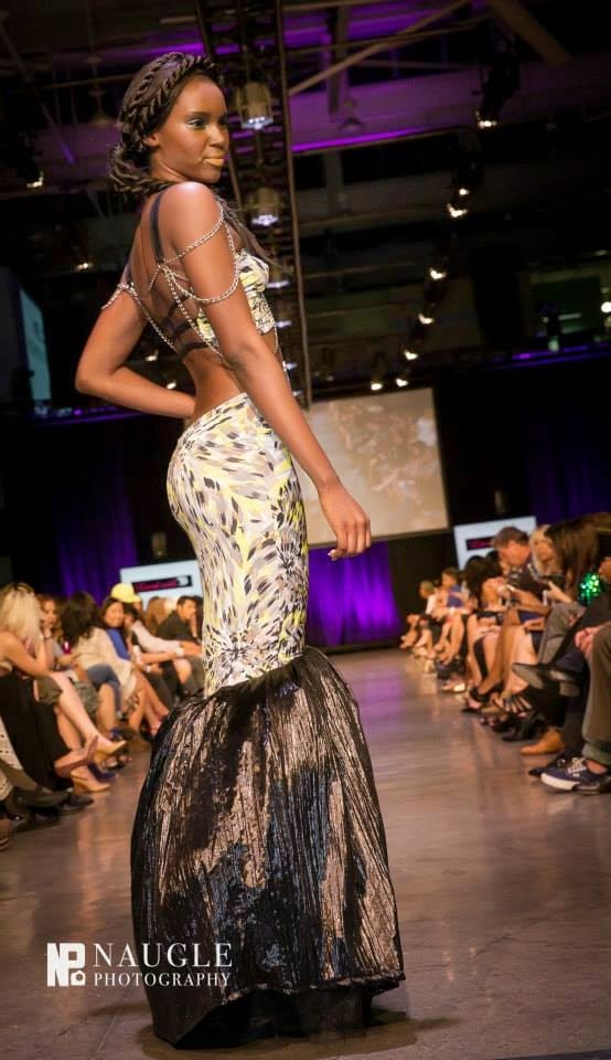 Model wearing a tailed mermaid dress during Fashion Week San Diego 2014 Night 3