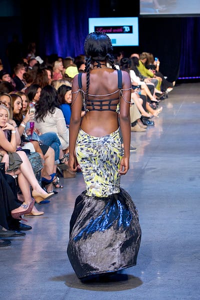 Model wearing a sexy mermaid tailed dress walking down the runway during Fashion Week San Diego 2014 Night 3