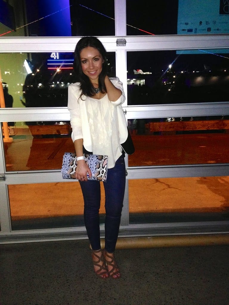 Blogger Nihan smiling and showing her outfit at  Fashion Week San Diego 2014 Night 2