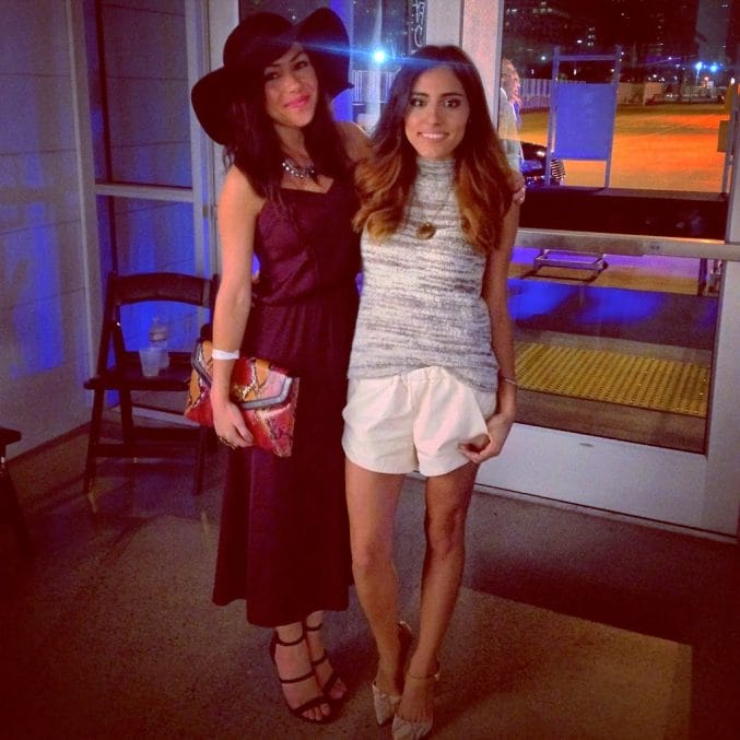 Blogger Nihan and her blogger friend are posing and showing their outfits on on Fashion Week San Diego 2014 Night 2