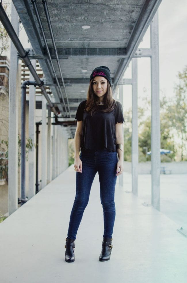Nihan wearing her Barbie beanie and pink and gold jewelry