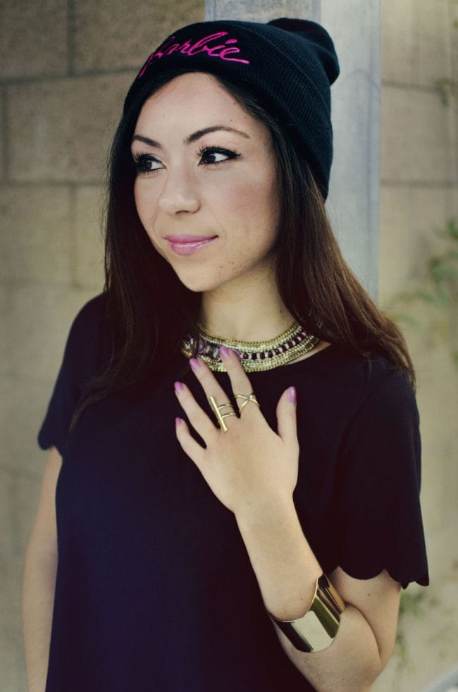 Nihan wearing her Barbie beanie and pink and gold jewelry