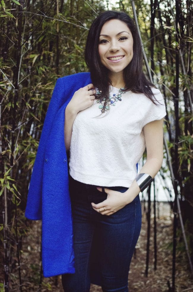 Fashion model showing her outfit and smiling and looking pretty