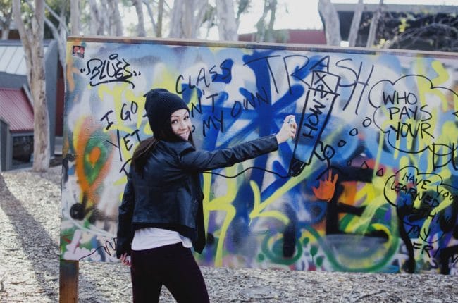 Model painting a graffiti and having a lot of fun in ucsd graffiti part