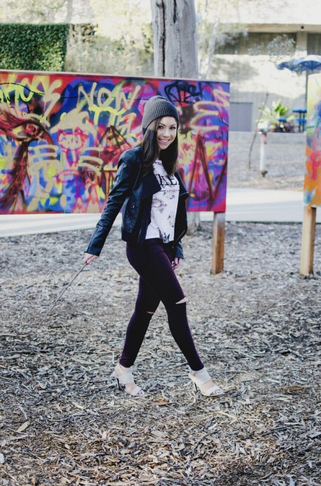 Model walking in a graffiti park