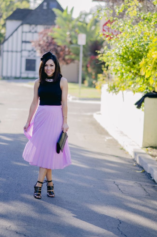 Style with Nihan wearing romantic Asos pleated pink maxi skirt, black top, black Topshop high heels, Topshop leather jacket and fancy head piece | Pink Valentine