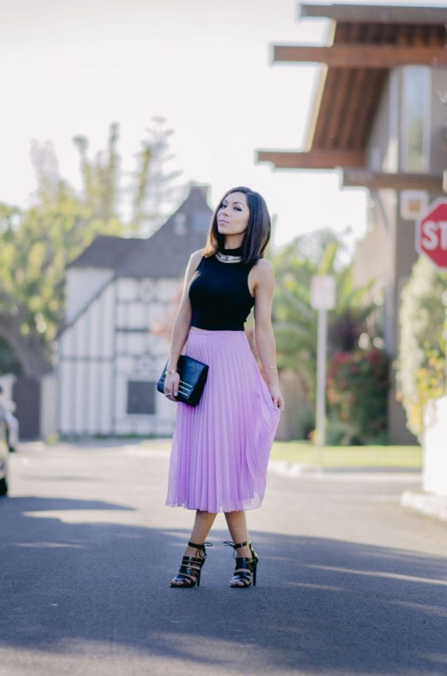 Style with Nihan wearing romantic Asos pleated pink maxi skirt, black top, black Topshop high heels, Topshop leather jacket and H&M studded purse | Pink Valentine