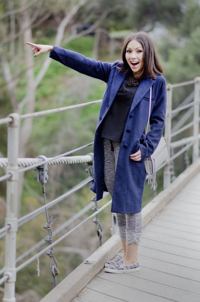 Nihan at Suspension Bridge in San Diego watching birds and showing her outfit