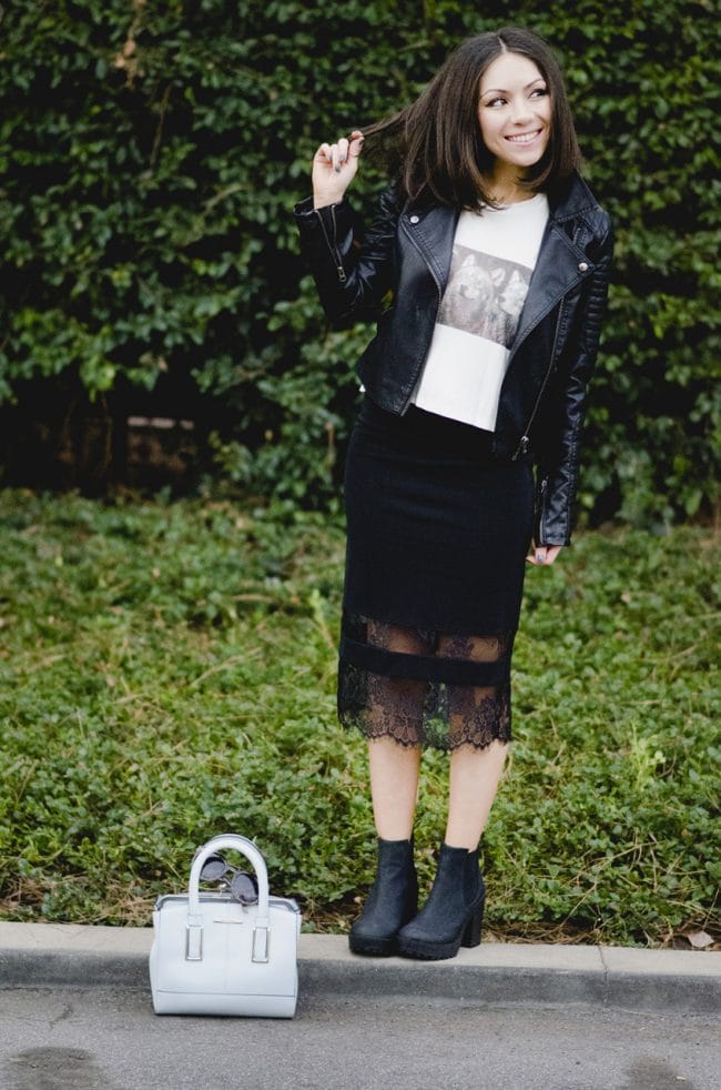 Blogger Nihan wearing black Topshop lace midi skirt, black leather jacket and baby blue River Island purse