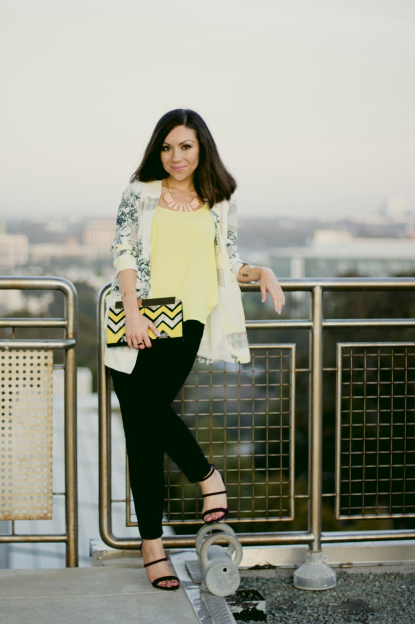 Stylist Nihan wearing Asos geometric printed blazer and Asos printed clutch