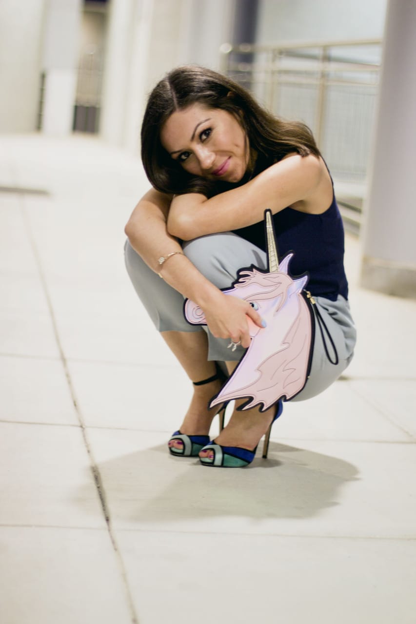 Nihan wearing topshop blue culottes, unicorn purse from asos, zara colorblock high-heels