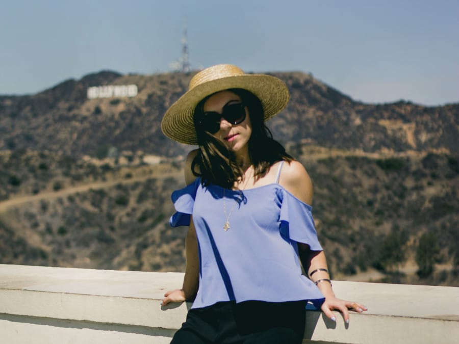 Nihan wearing Topshop cold shoulder top and Lack of Color Spencer Fedora at Griffith Observatory in Los Angeles