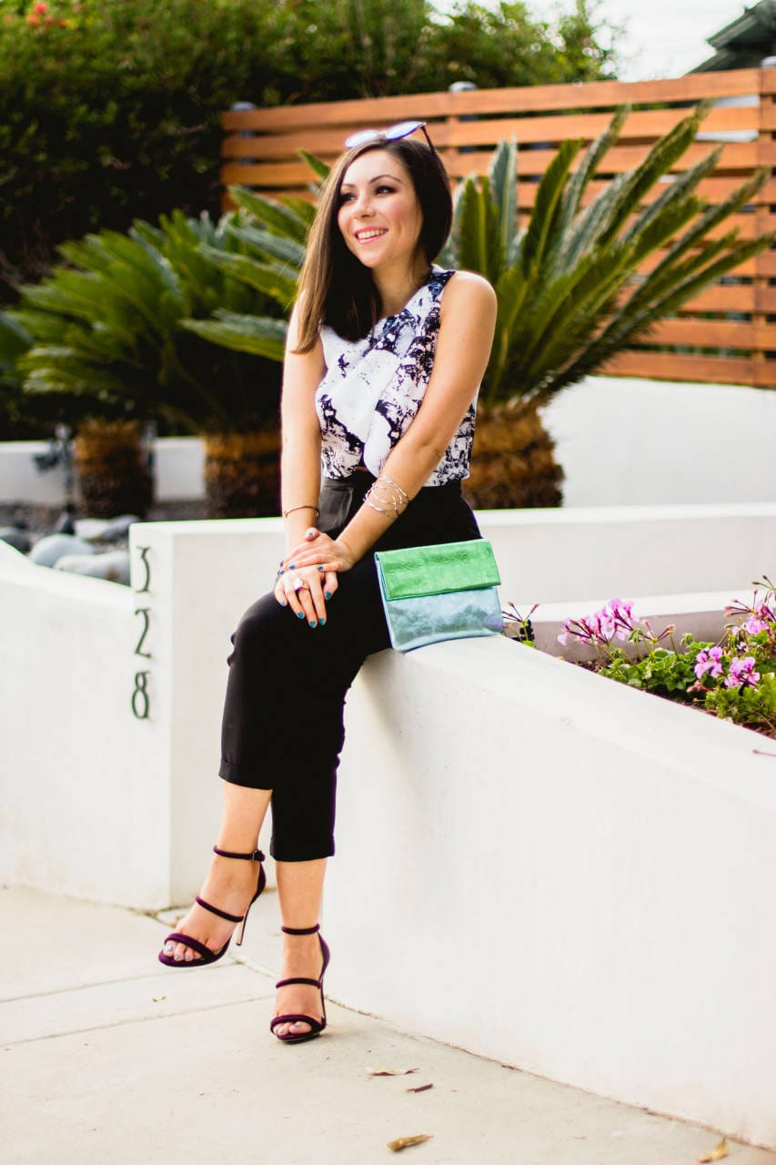 Strappy high-heels and metallic clutch