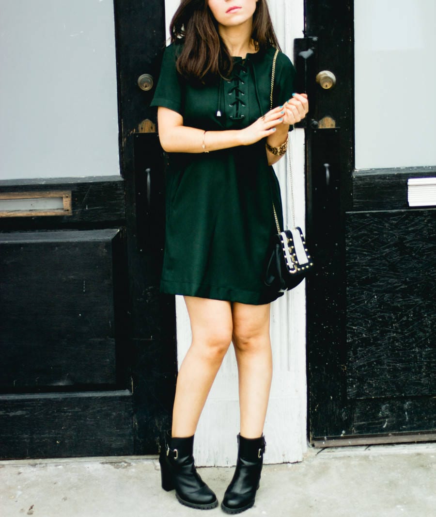 Fashion blogger Nihan wearing a Topshop mini dress and high-heeled boots from JustFab