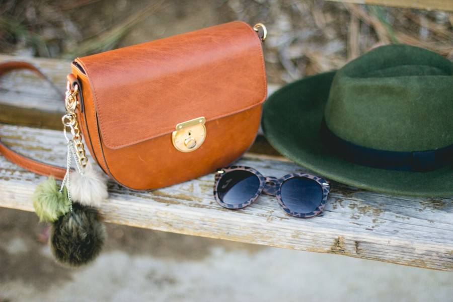 Green wool hat and brown purse
