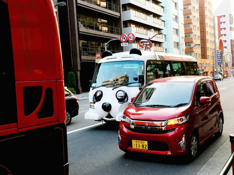 Cute blinking cars in Tokyo Japan