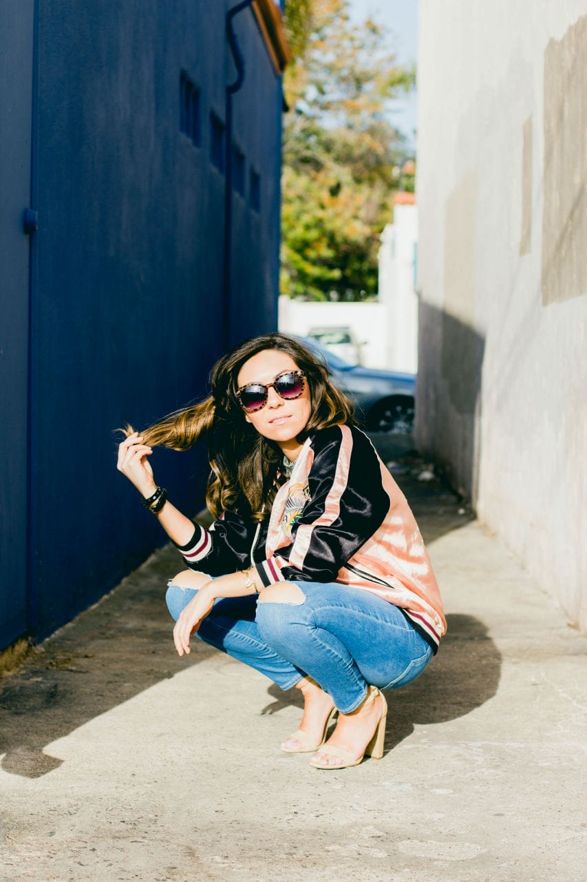 Japan print bomber jacket, Topshop ripped jeans and Steve Madden Carrson high heels 