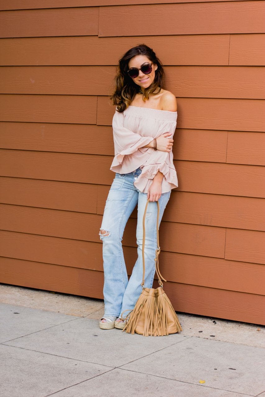Flare jeans and off the shoulder bell sleeve top 3