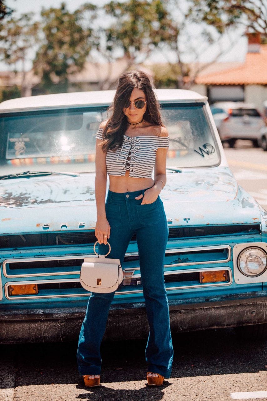 how to style flare jeans to look taller