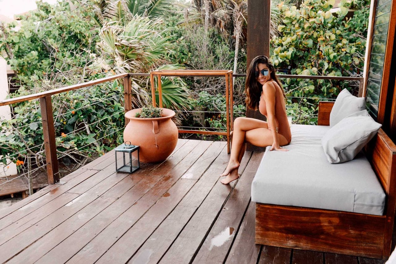 wearing one piece H&M swimsuit with lacing in La Zebra Hotel Tulum