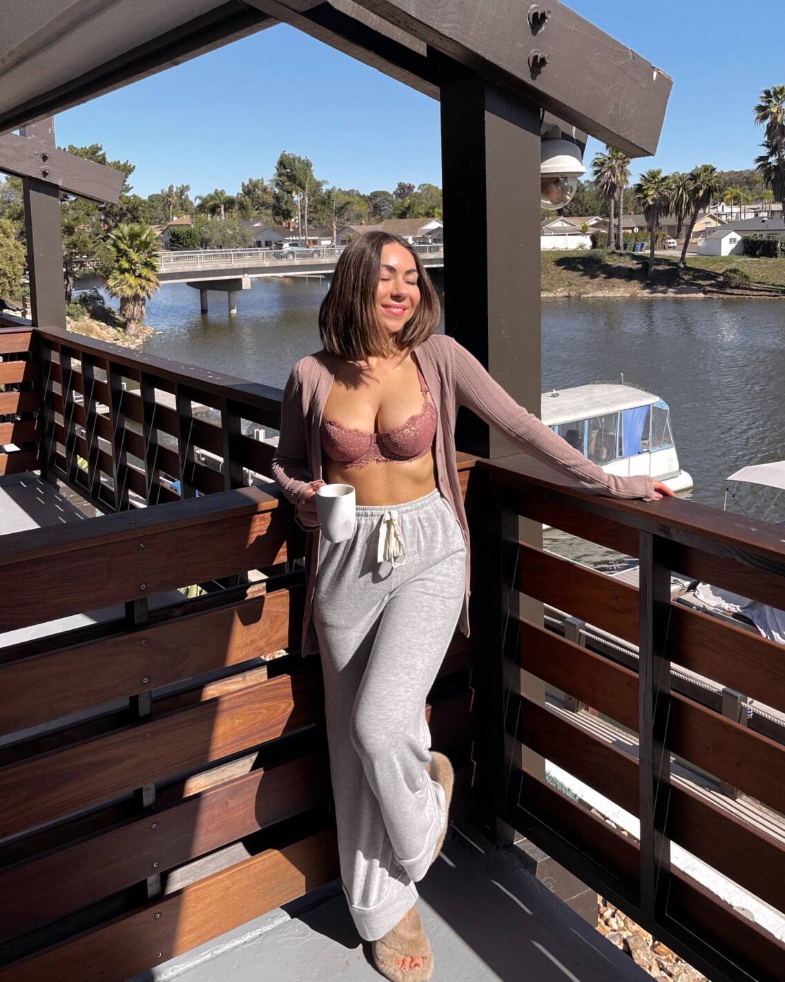 Style with Nihan morning coffee wearing loungewear in patio Lakehouse Hotel San Marcos